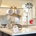 ⁦كافيه بحامل استيل دهبي رقم 22⁩ - الصورة ⁦2⁩